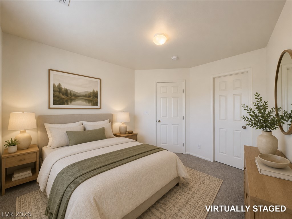 9456 Grandview Spring Avenue Las Vegas, NV 89166 - Photo 27 of 49 Virtually Staged. A well-lit bedroom with comfortable carpeting, offering ample space and serene comfort.