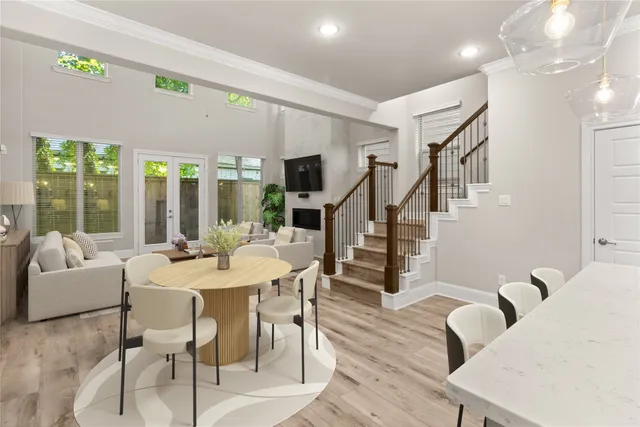 a kitchen with sink cabinets and wooden floor