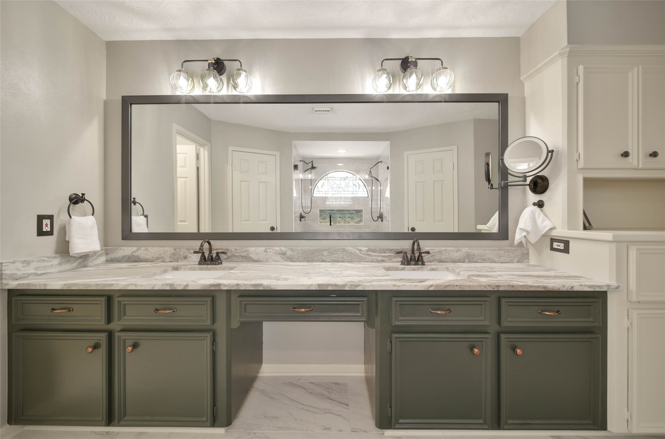 17007 Windrow Drive Spring, TX 77379 - Photo 25 of 46 a bathroom with a granite countertop sink a large mirror and vanity