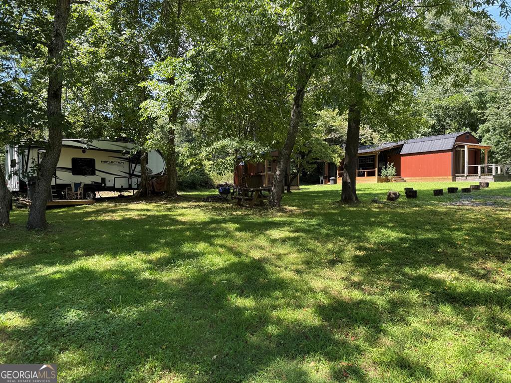 43 Wild Horse Road Sylva, NC 28779 - Photo 1 of 28 a view of a park with large trees