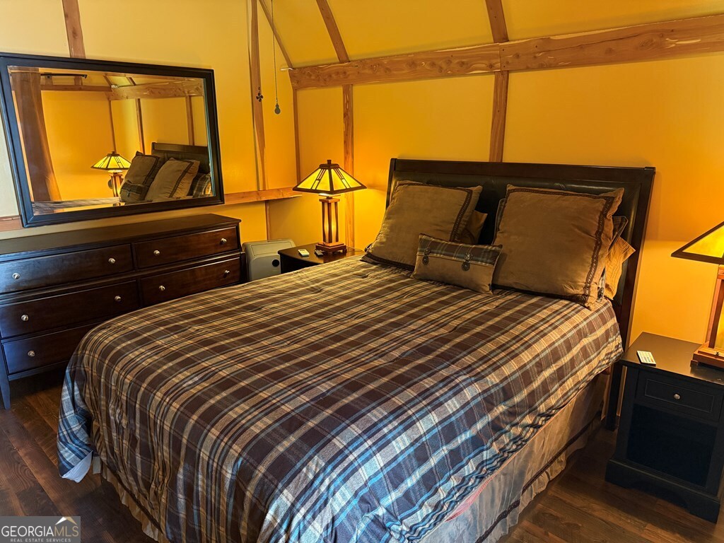 43 Wild Horse Road Sylva, NC 28779 - Photo 25 of 28 a bedroom with a bed and window