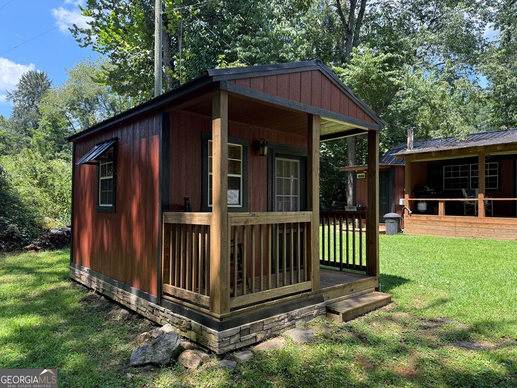 43 Wild Horse Road Sylva, NC 28779 - Photo 3 of 28 a view of a small house with yard