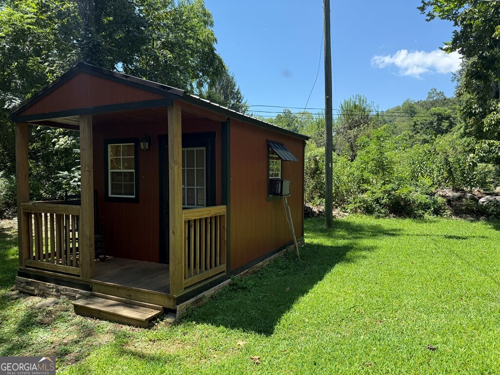 43 Wild Horse Road Sylva, NC 28779 - Photo 4 of 28 a view of a house with a yard