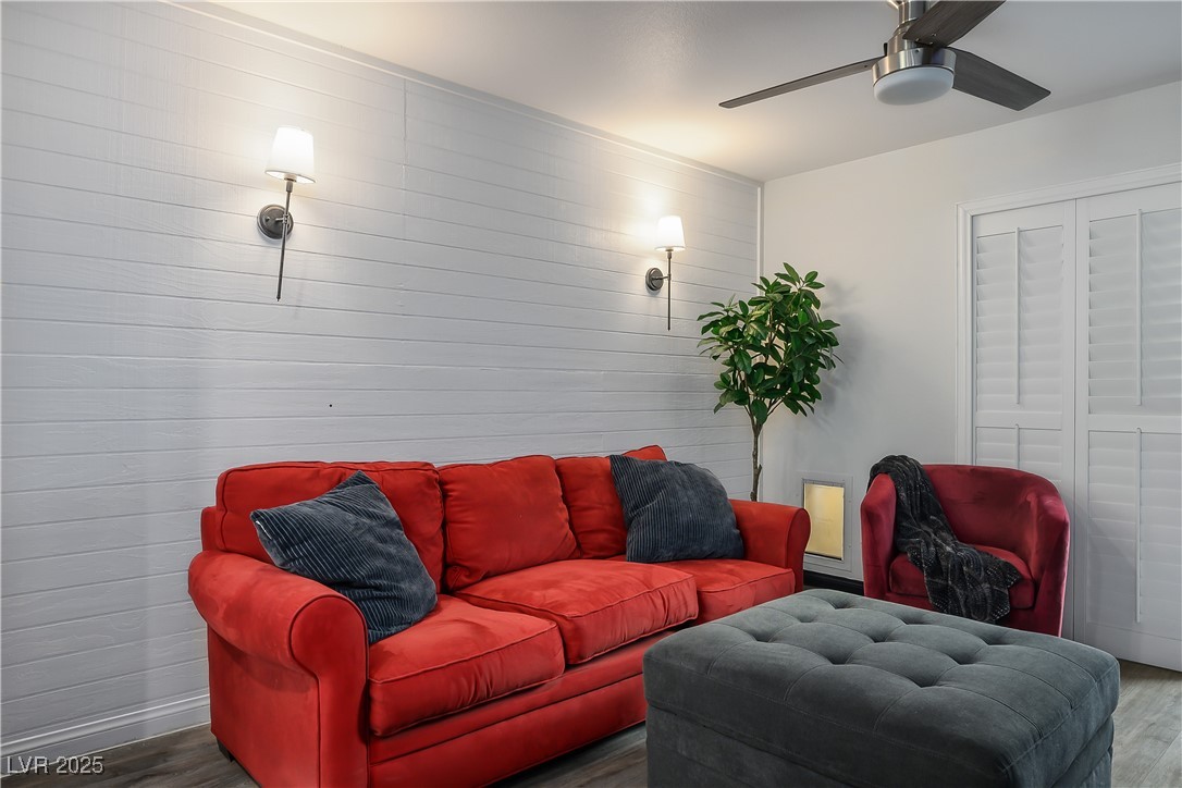 12236 Glass Desert Road, Unit 2 Las Vegas, NV 89183 - Photo 16 of 32 Living room with wood finished floors and ceiling fan
