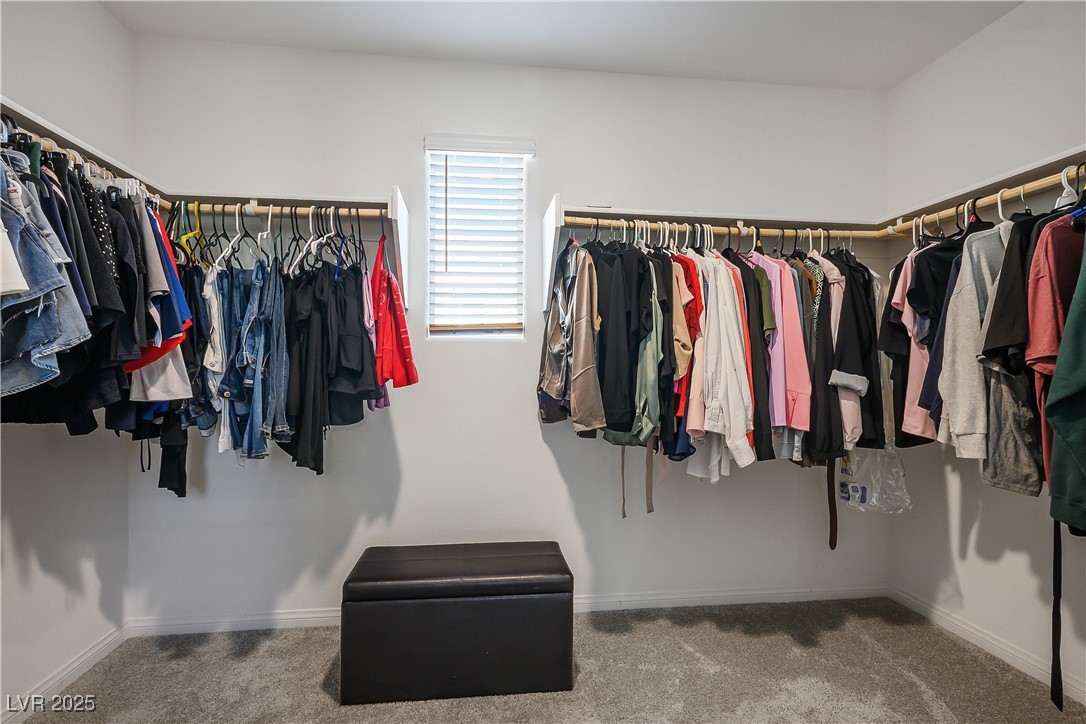 12236 Glass Desert Road, Unit 2 Las Vegas, NV 89183 - Photo 27 of 32 Spacious closet featuring light carpet