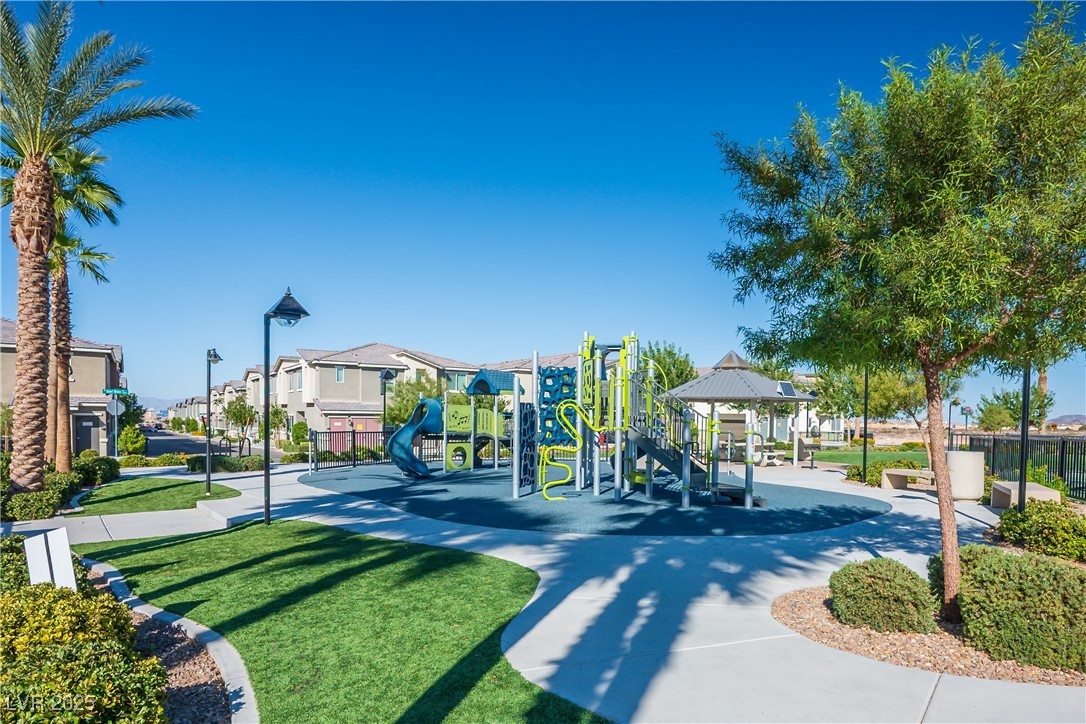 12236 Glass Desert Road, Unit 2 Las Vegas, NV 89183 - Photo 4 of 32 Communal playground with a gazebo, a residential view, and a patio