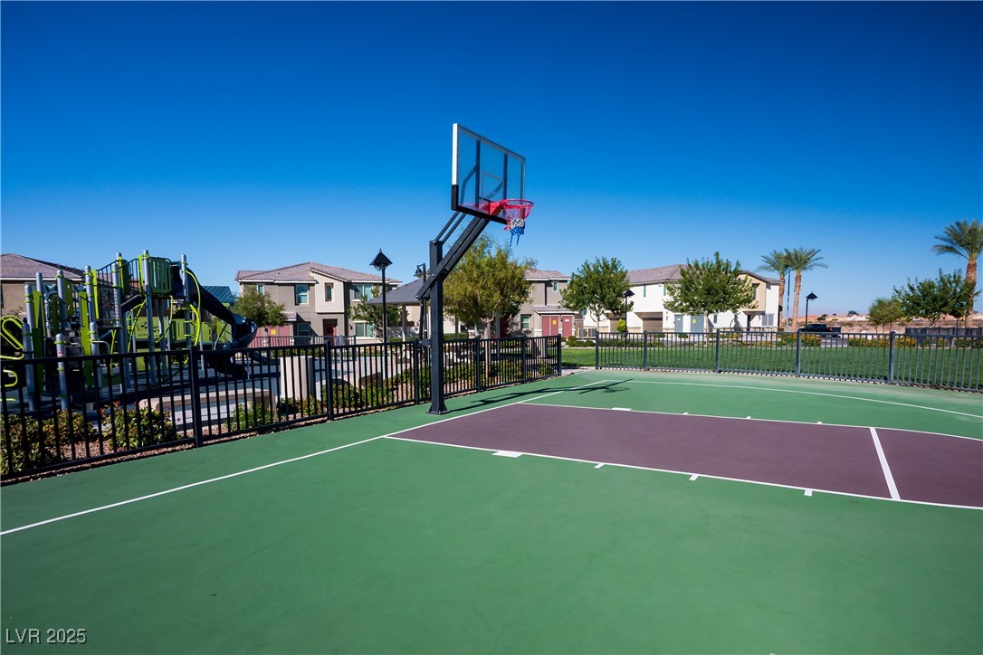 12236 Glass Desert Road, Unit 2 Las Vegas, NV 89183 - Photo 5 of 32 View of sport court featuring community basketball court and a residential view