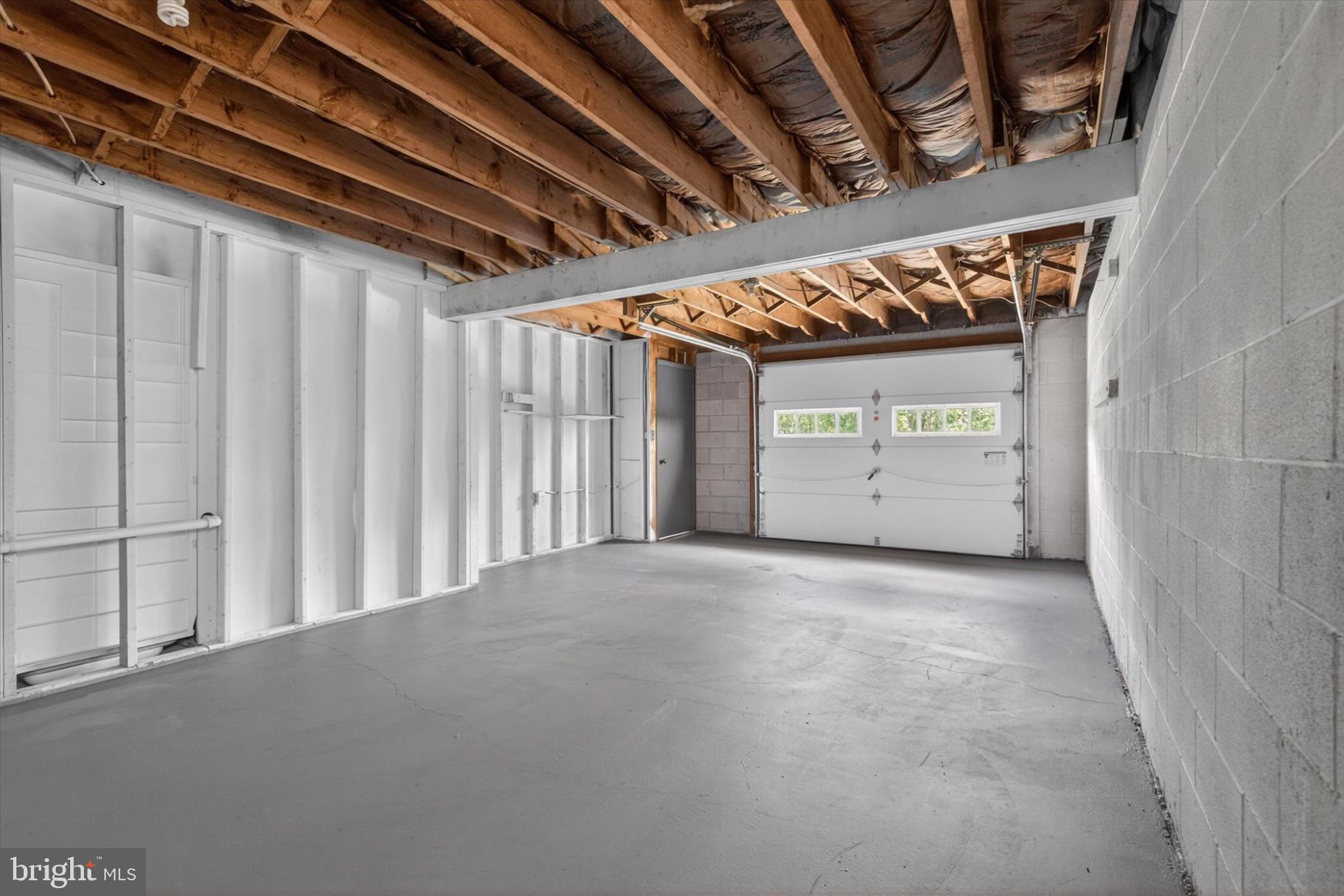 240 Harman Road Halifax, PA 17032 - Photo 27 of 31 Spacious garage with natural light.