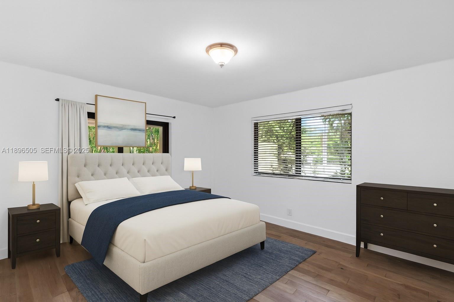 8501 Southwest 68th St Road Miami, FL 33143 - Photo 28 of 51 a bedroom with a bed and a dresser