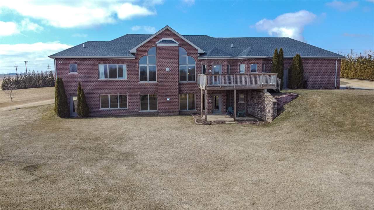 3097 North Marrill Road Byron, IL 61010 - Photo 29 of 40 a view of a house with a yard