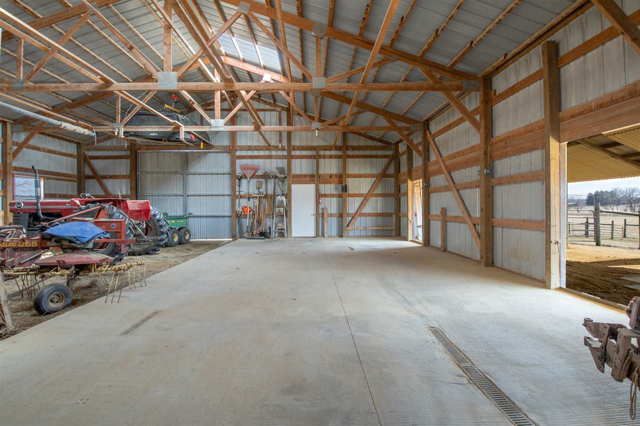 3097 North Marrill Road Byron, IL 61010 - Photo 31 of 40 a view of a room with storage and utility room