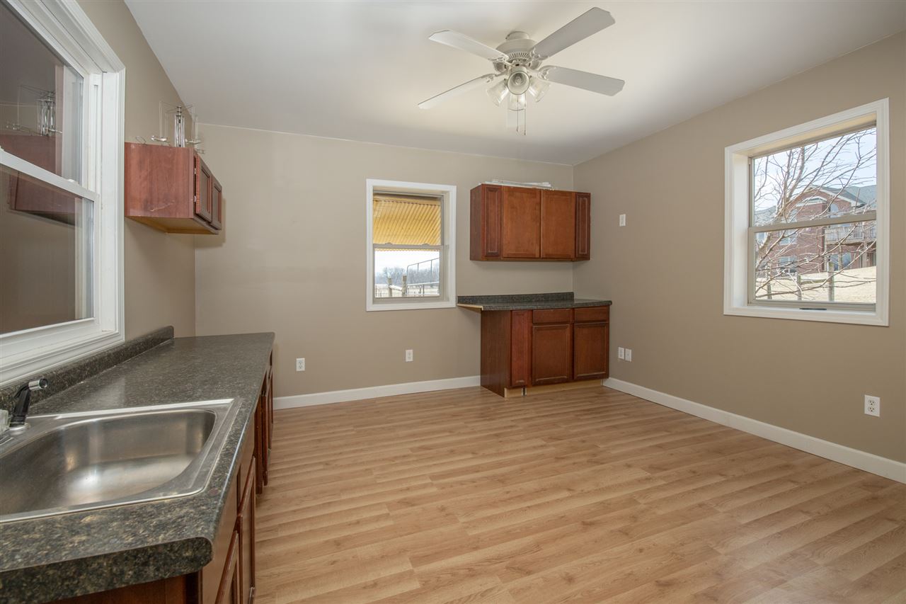 3097 North Marrill Road Byron, IL 61010 - Photo 33 of 40 a view of a kitchen and microwave area