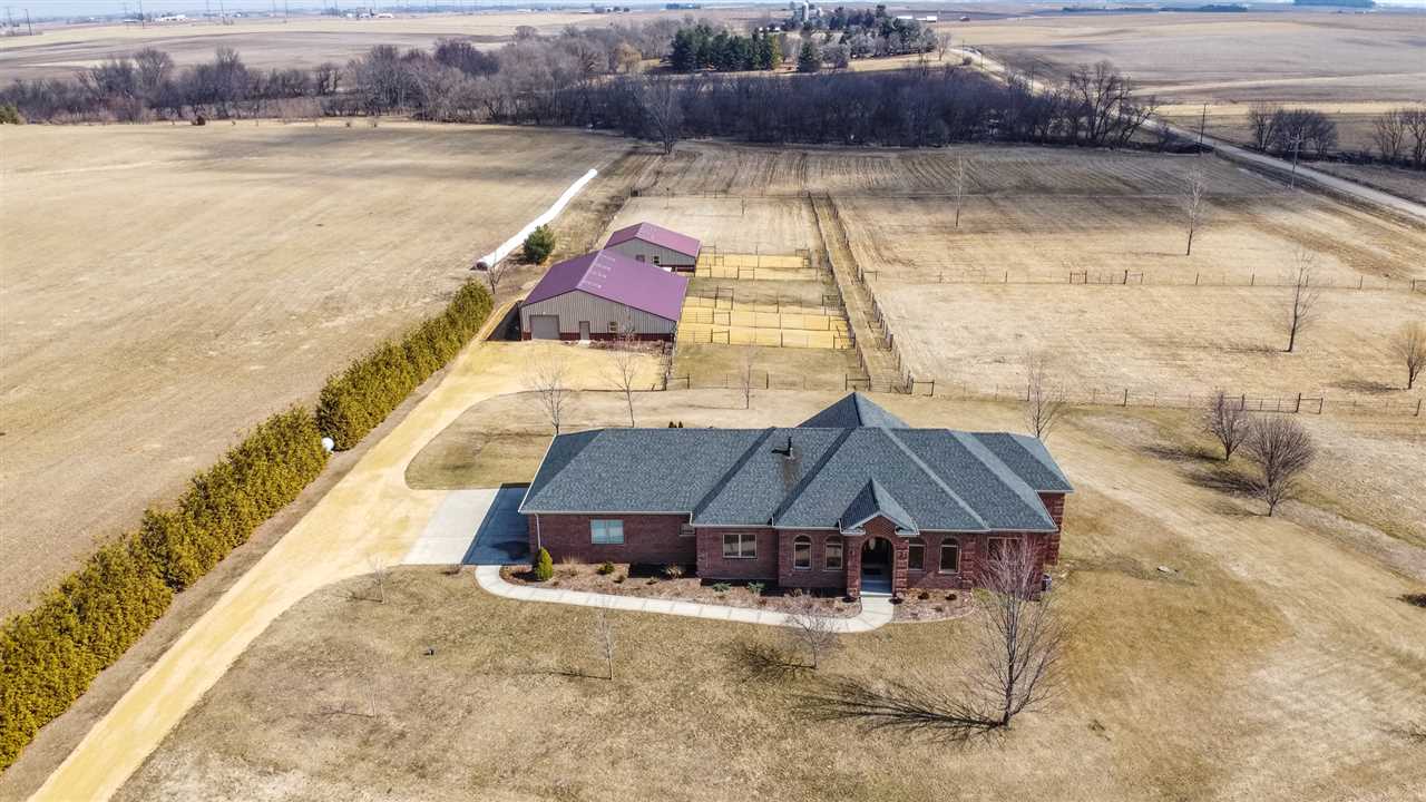 3097 North Marrill Road Byron, IL 61010 - Photo 38 of 40 a room with a bed and a table
