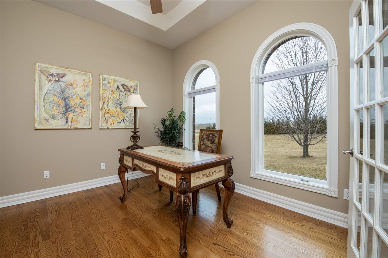 3097 North Marrill Road Byron, IL 61010 - Photo 4 of 40 a room with furniture and a window