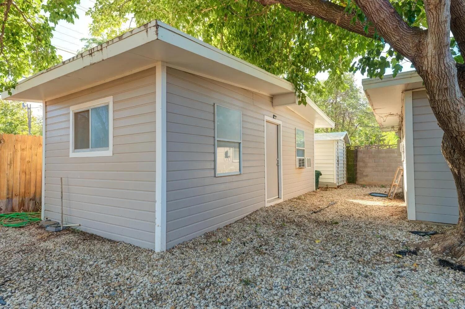 2407 46th Street Lubbock, TX 79412 - Photo 10 of 10 a view of a house with a yard