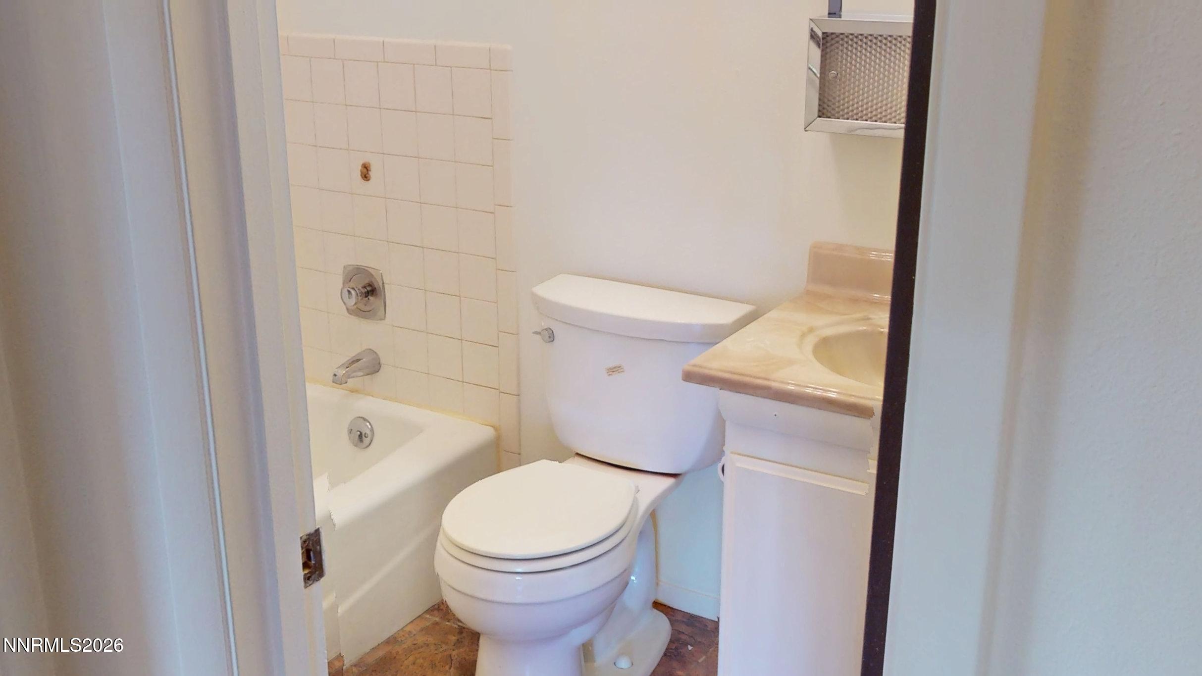 440 East Minor Street Winnemucca, NV 89445 - Photo 9 of 12 a bathroom with a toilet and a shower