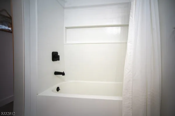 a bathroom with a bathtub