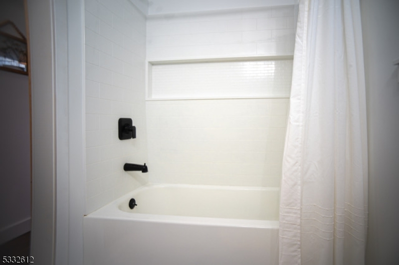 2467 Highway 10, Unit 198A Morris Plains, NJ 07950 - Photo 8 of 8 a bathroom with a bathtub