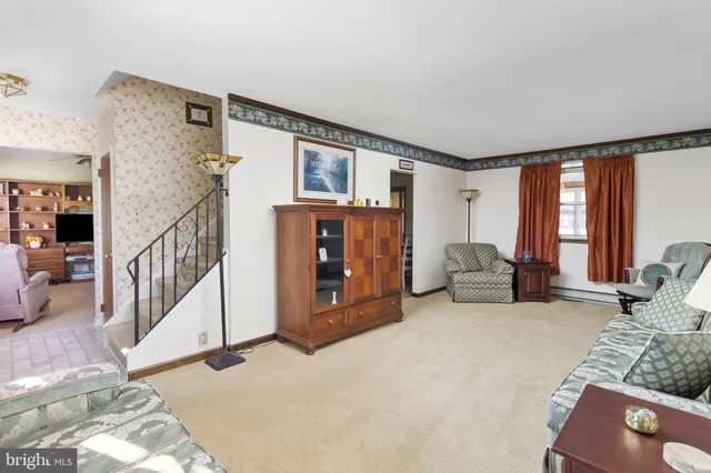 a living room with furniture and a couch