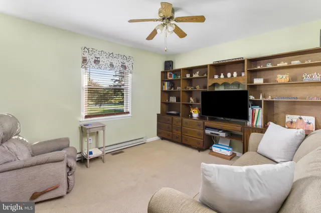 a living room with furniture and a couch