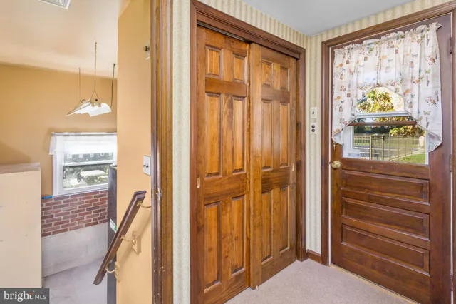 a bathroom with a sink a washer and dryer