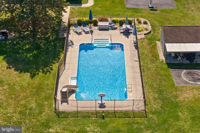 a view of a lake with a garden