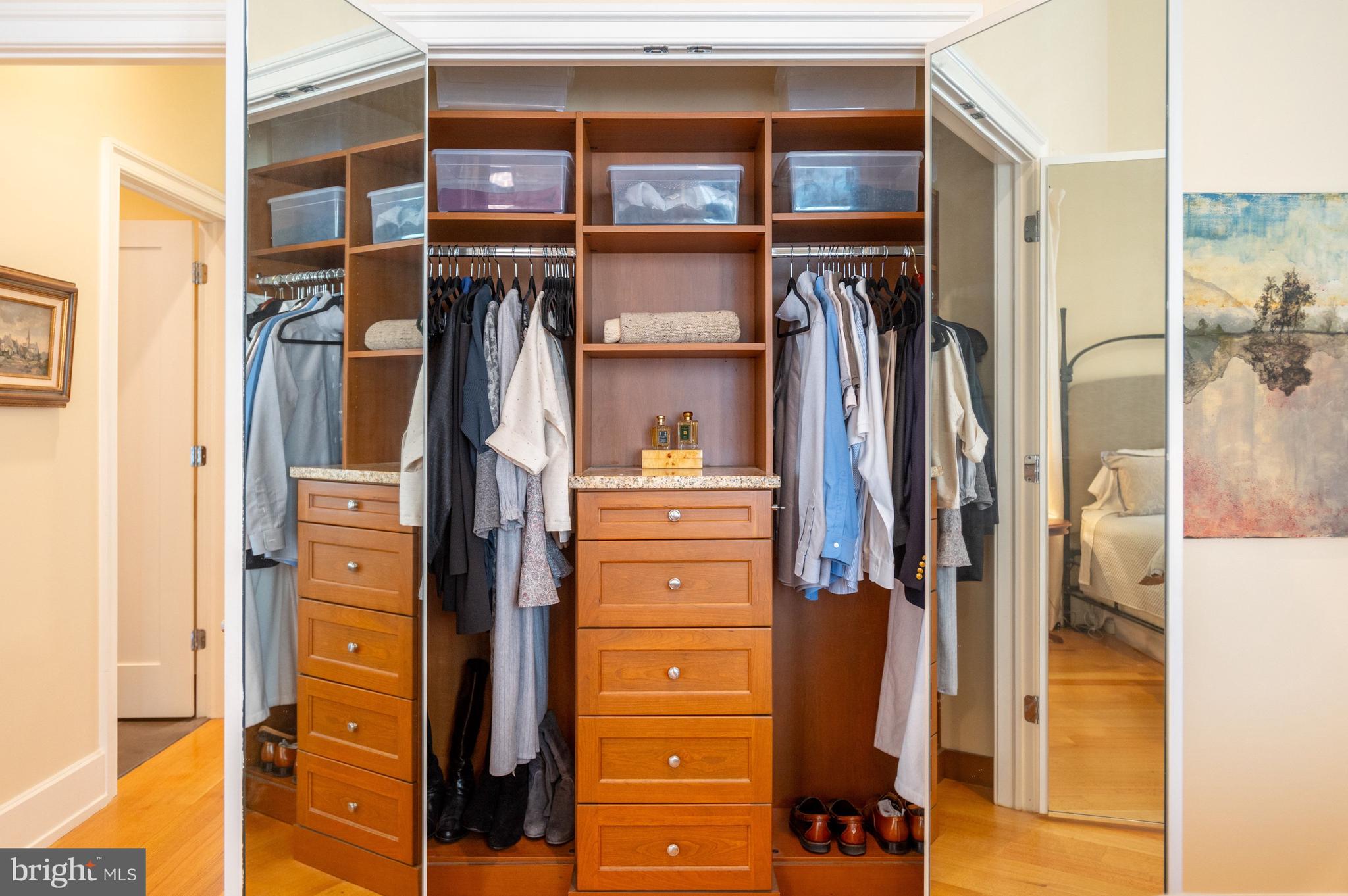 2516 Q Street Northwest, Unit C201 Washington, DC 20007 - Photo 14 of 20 a view of walk in closet with clothes and shoes