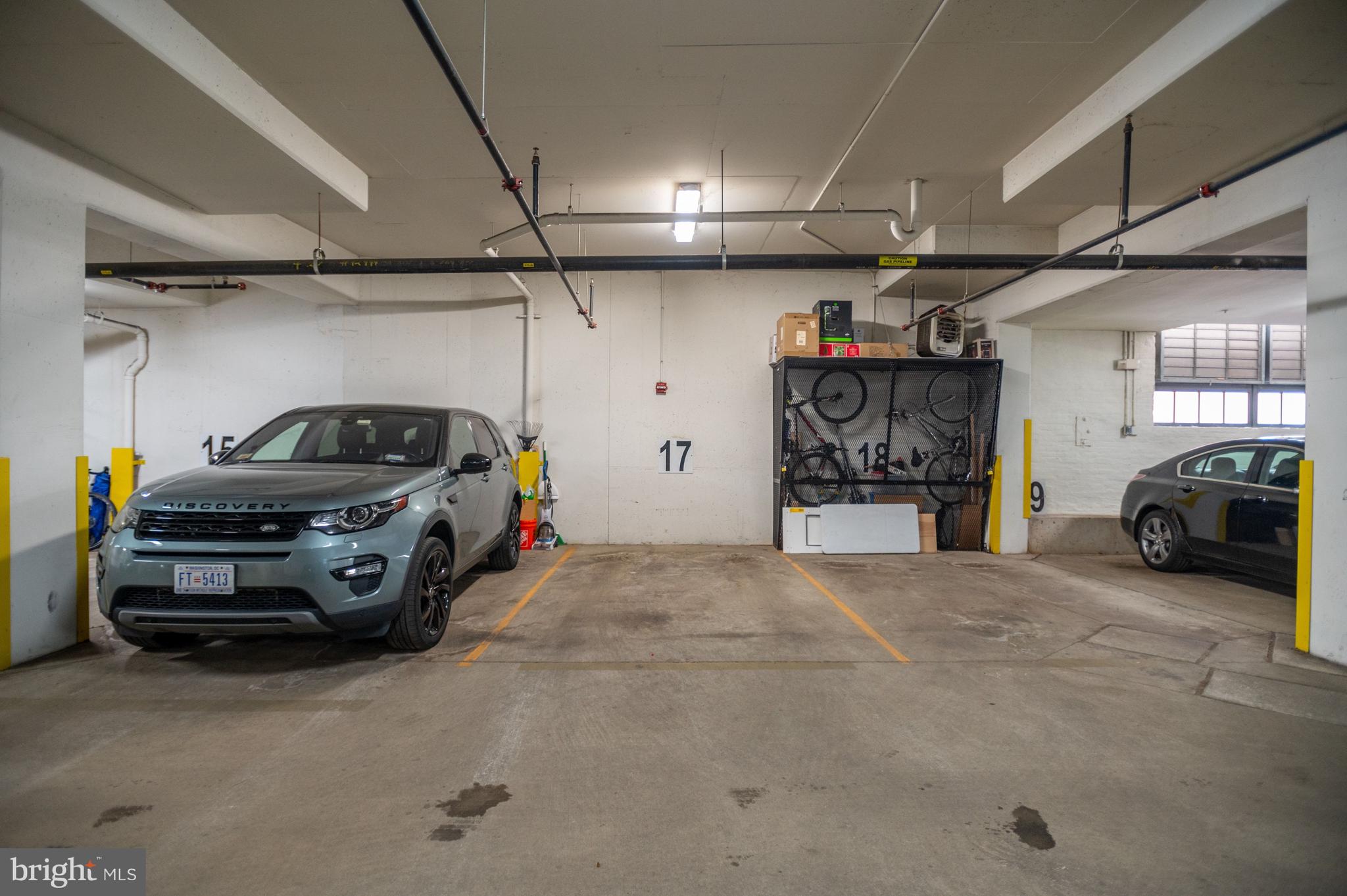 2516 Q Street Northwest, Unit C201 Washington, DC 20007 - Photo 18 of 20 a view of parking garage with cars