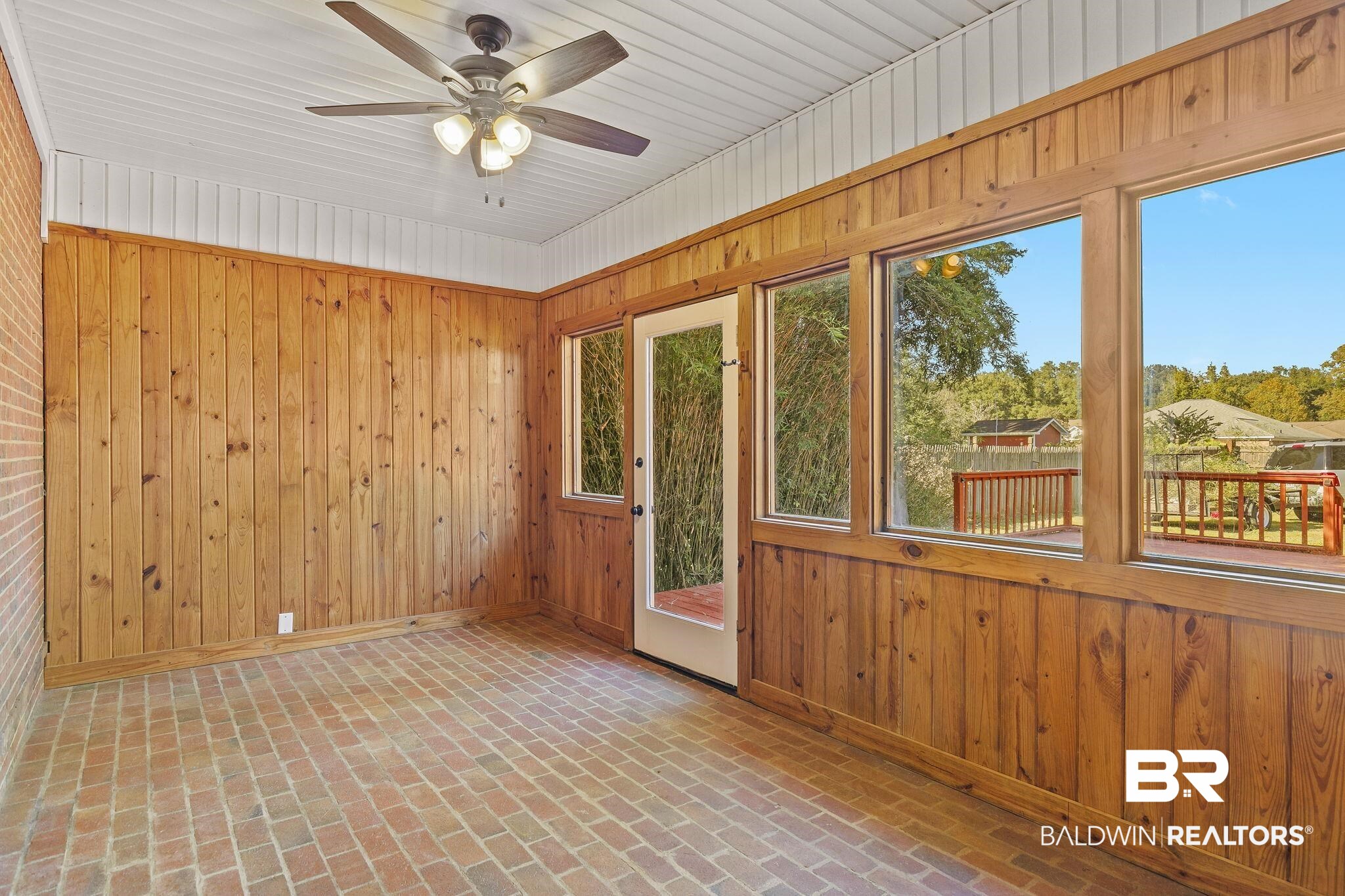 9631 Bay Meadows Avenue Fairhope, AL 36532 - Photo 35 of 49 Unfurnished sunroom featuring ceiling fan