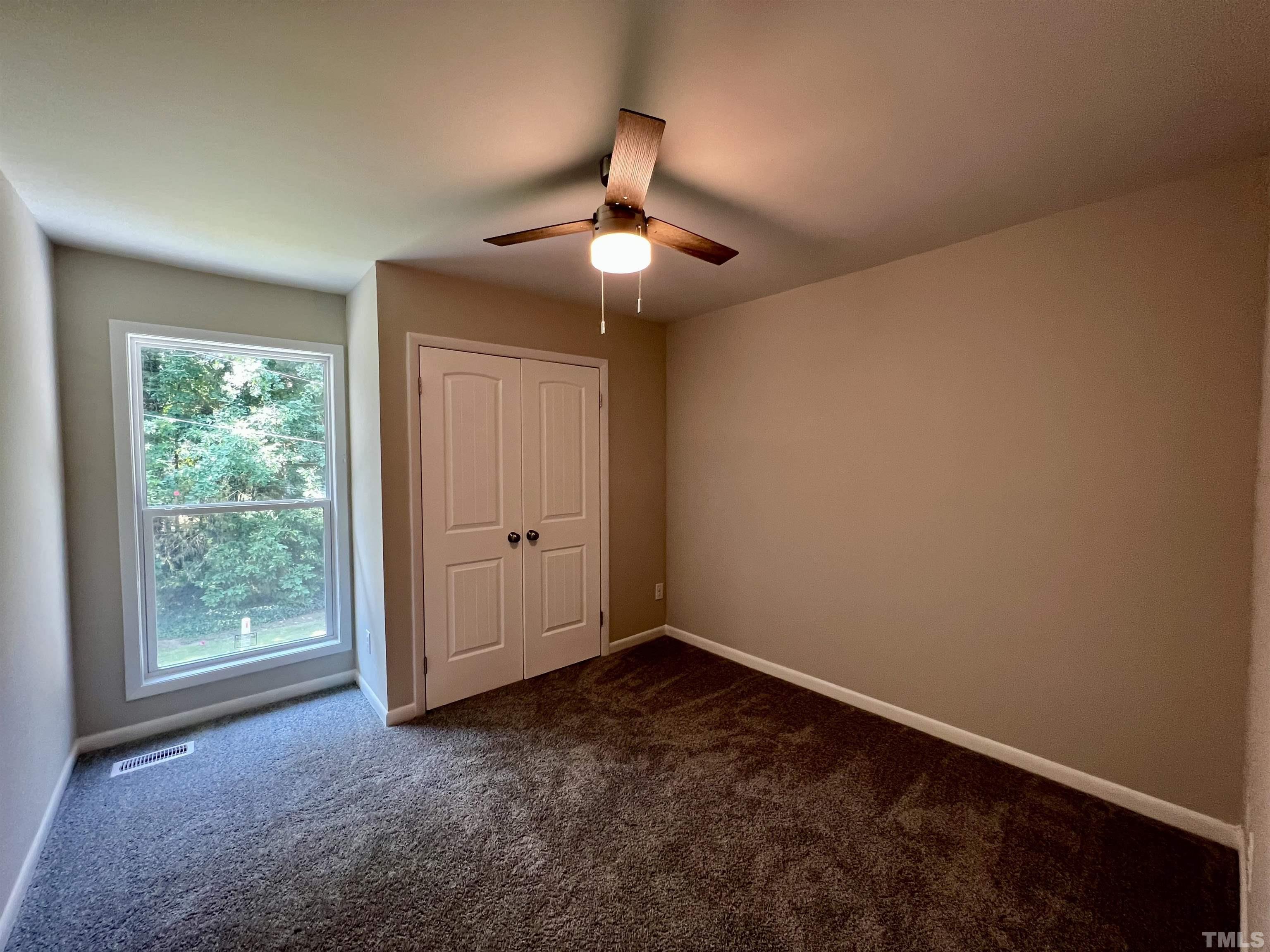 1304 Seaton Road Durham, NC 27713 - Photo 15 of 18 a view of an empty room with a window
