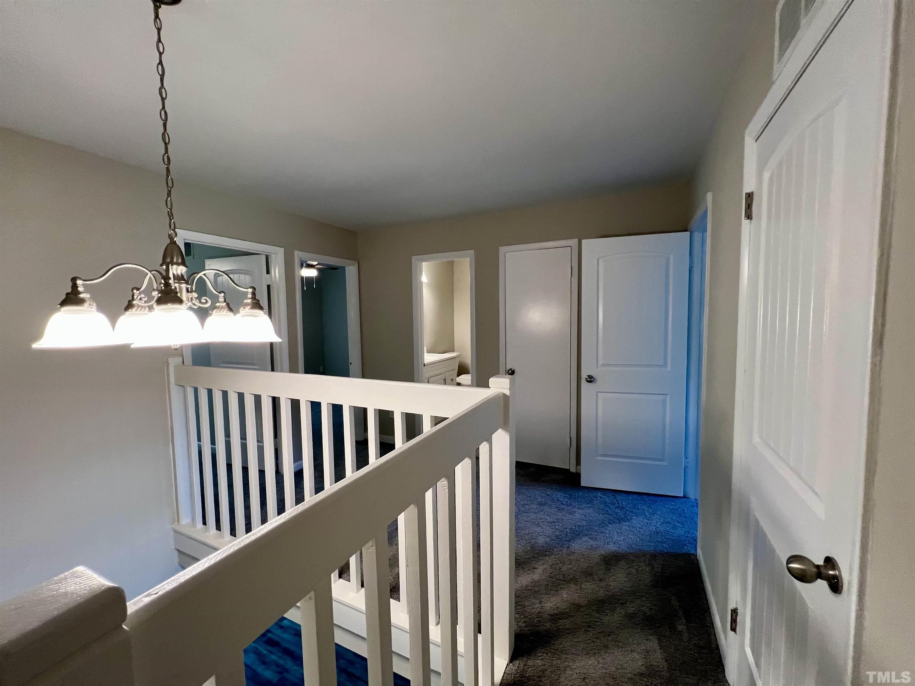 1304 Seaton Road Durham, NC 27713 - Photo 10 of 18 a view of a hallway with a livingroom