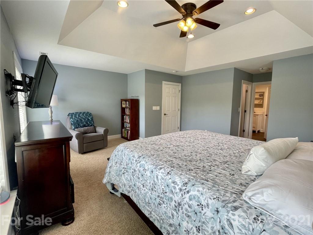 4004 Lamington Road Matthews, NC 28105 - Photo 11 of 31 a bedroom with a bed dresser and a window