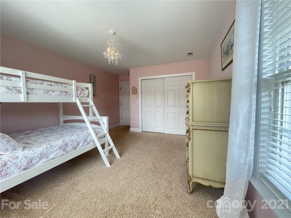 4004 Lamington Road Matthews, NC 28105 - Photo 18 of 31 a bedroom with bed and a window