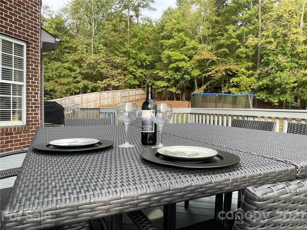 4004 Lamington Road Matthews, NC 28105 - Photo 29 of 31 a view of a patio with chair and table