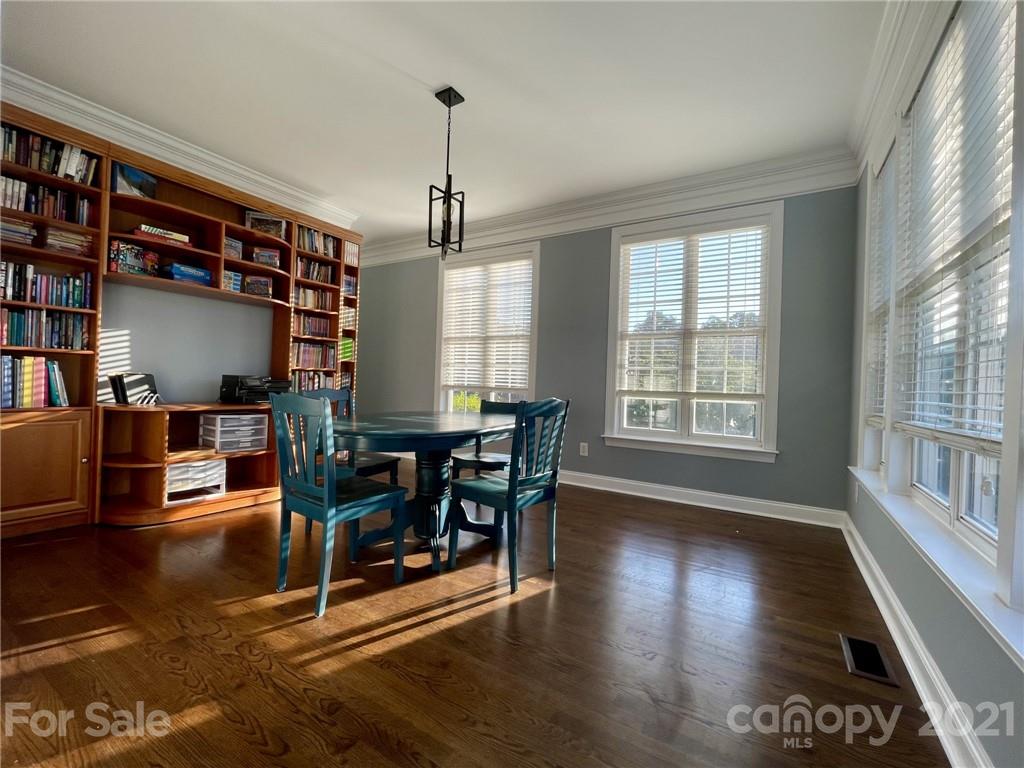 4004 Lamington Road Matthews, NC 28105 - Photo 7 of 31 a view of a livingroom with furniture window and wooden floor