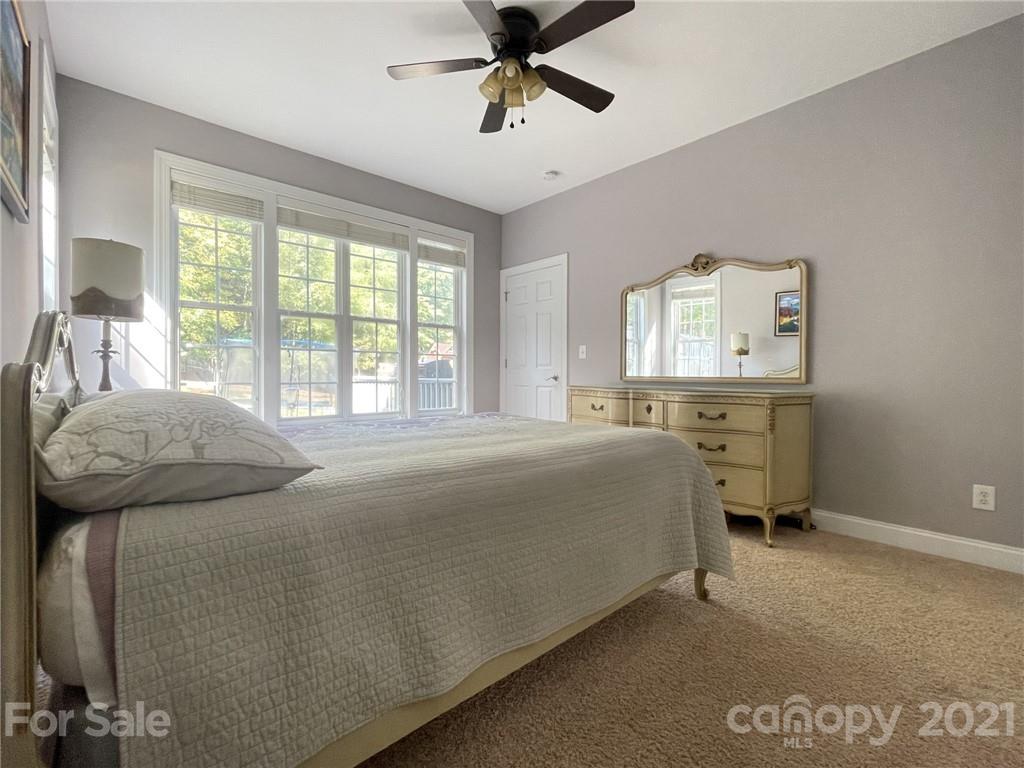 4004 Lamington Road Matthews, NC 28105 - Photo 9 of 31 a bedroom with a bed and a window
