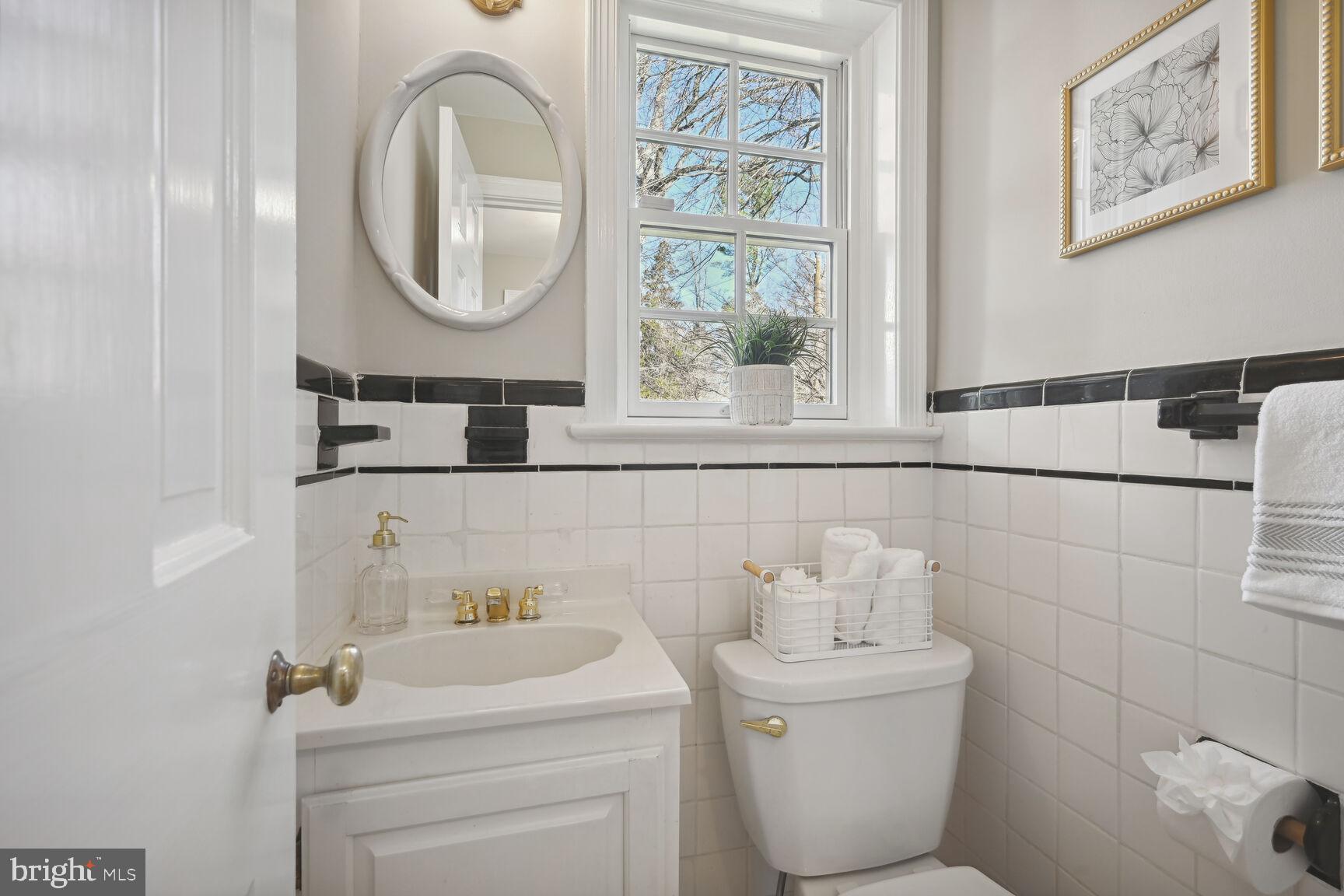 315 Ellsworth Drive Silver Spring, MD 20910 - Photo 21 of 49 Convenient main floor powder room off the foyer
