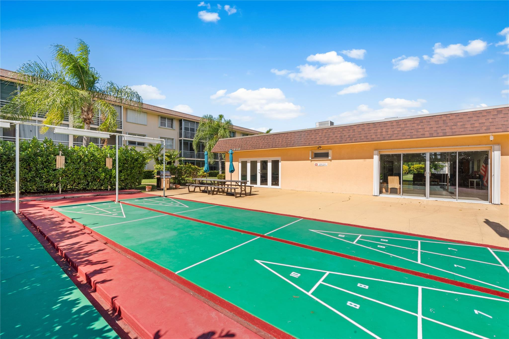 4500 North Federal Highway, Unit 156 Lighthouse Point, FL 33064 - Photo 15 of 23 a view of an house with backyard and a swimming pool