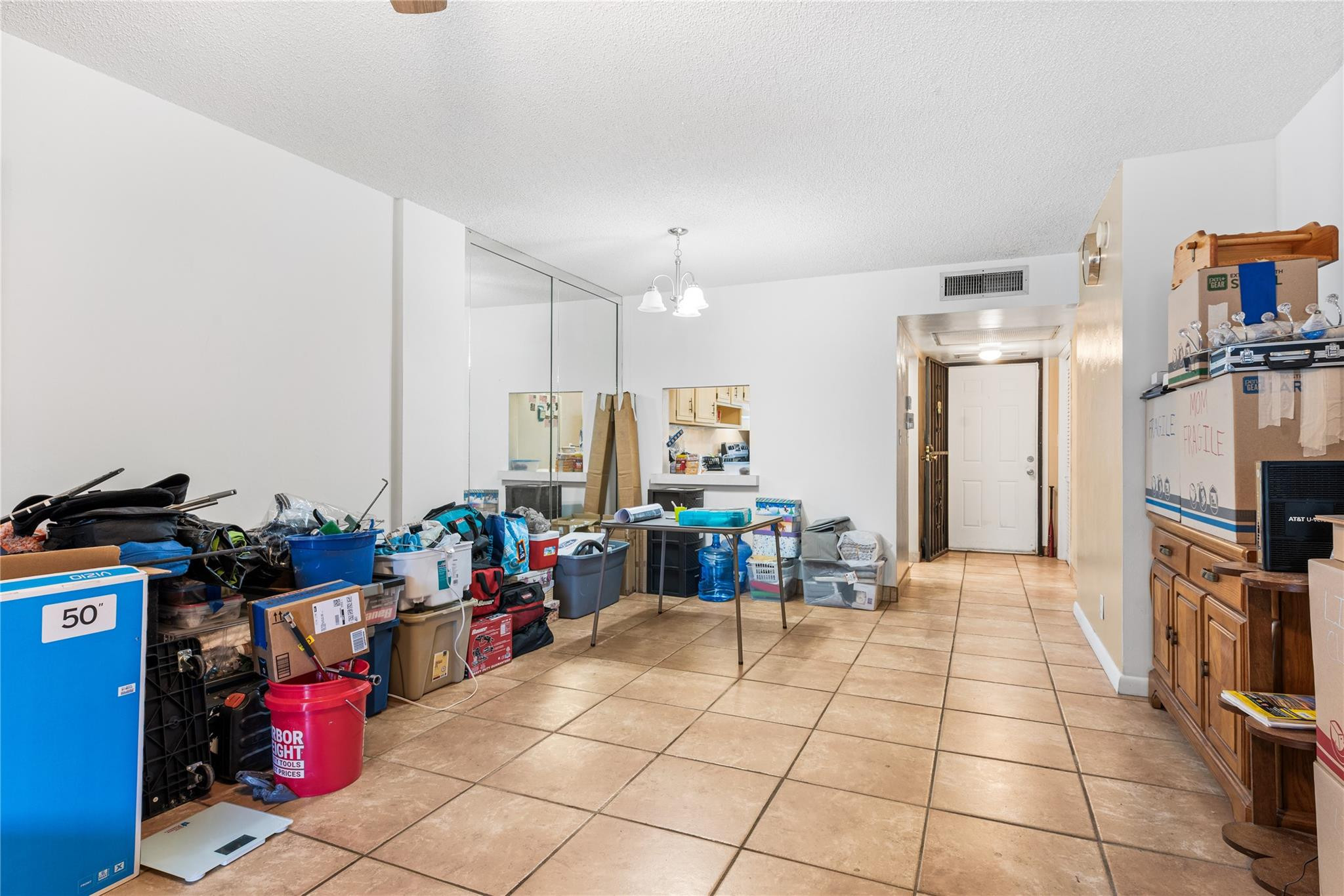 4500 North Federal Highway, Unit 156 Lighthouse Point, FL 33064 - Photo 3 of 23 a living room with lots of furniture and a fireplace