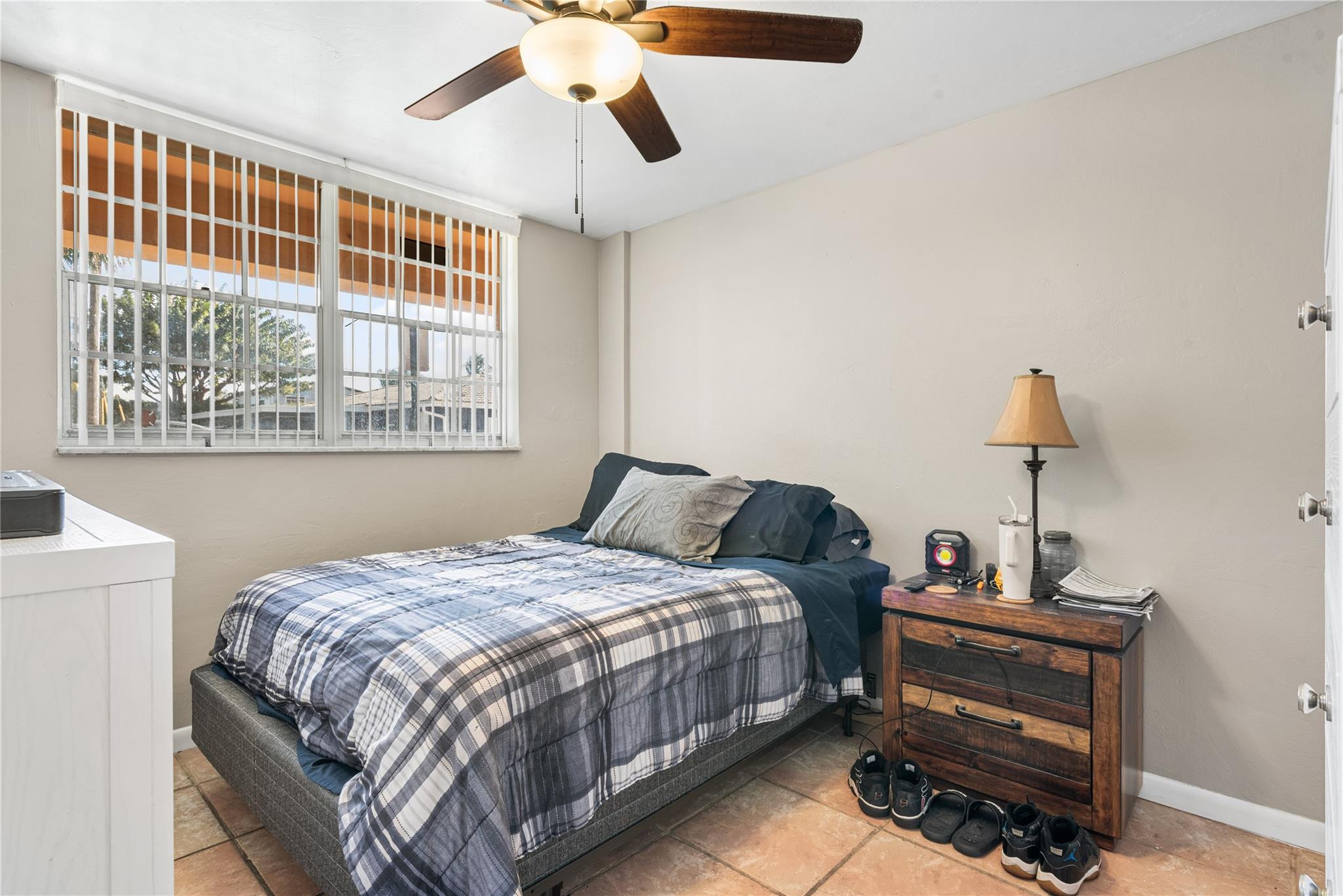 4500 North Federal Highway, Unit 156 Lighthouse Point, FL 33064 - Photo 7 of 23 a bedroom with a bed and wooden floor