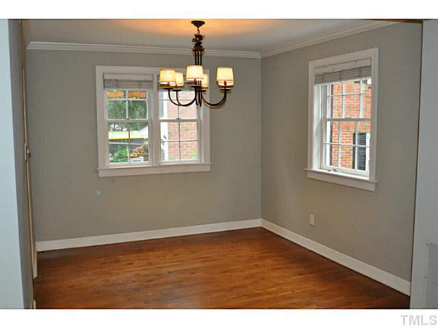 1000 Nichols Drive Raleigh, NC 27605 - Photo 4 of 21 Dining room is just off the kitchen and also has beautiful hardwood floors, fresh paint and updated chandelier.
