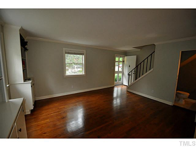 1000 Nichols Drive Raleigh, NC 27605 - Photo 8 of 21 Look towards family room from the dining room.