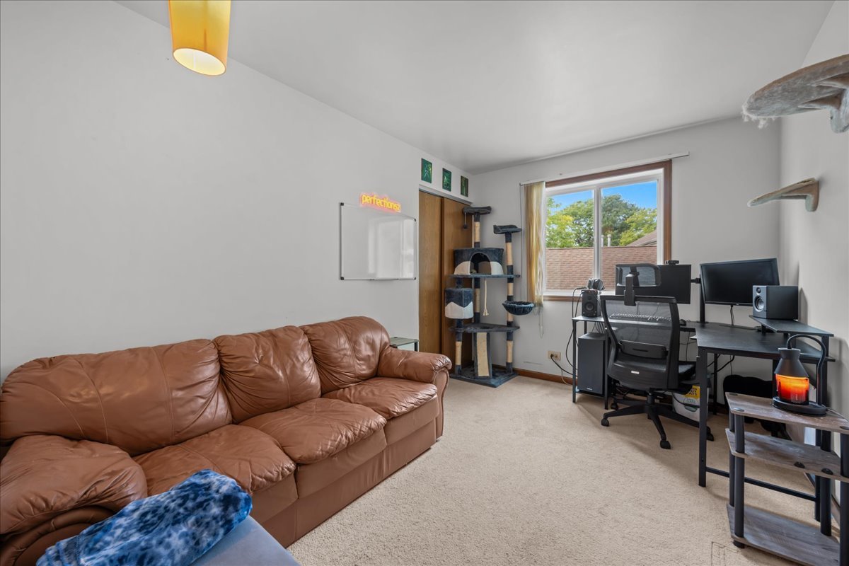 2691 Stanton Court Aurora, IL 60502 - Photo 14 of 17 a living room with furniture and a window