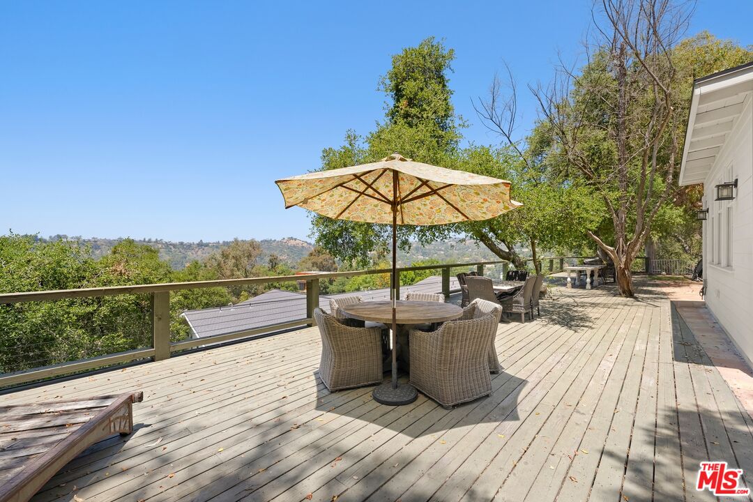 9609 Oak Pass Road Beverly Hills, CA 90210 - Photo 15 of 16 a view of a terrace with sitting area