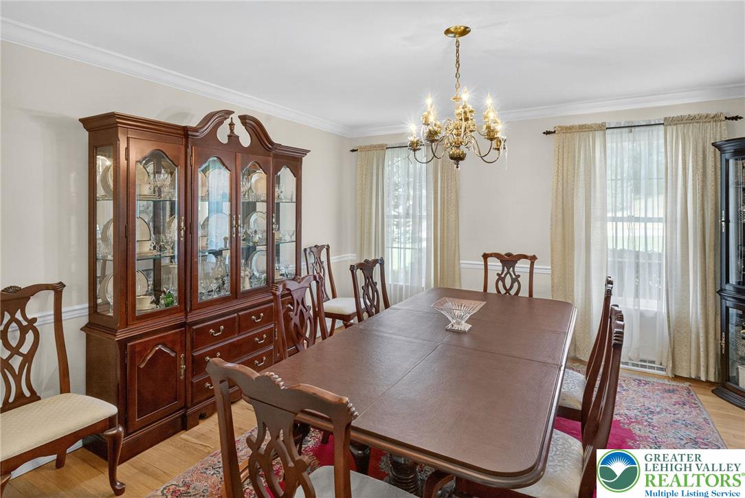 1830 Sherwood Road Allentown, PA 18103 - Photo 16 of 68 a view of a dining room with furniture window and wooden floor