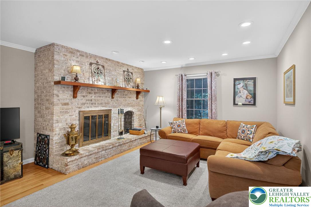1830 Sherwood Road Allentown, PA 18103 - Photo 19 of 68 a living room with furniture and a fireplace