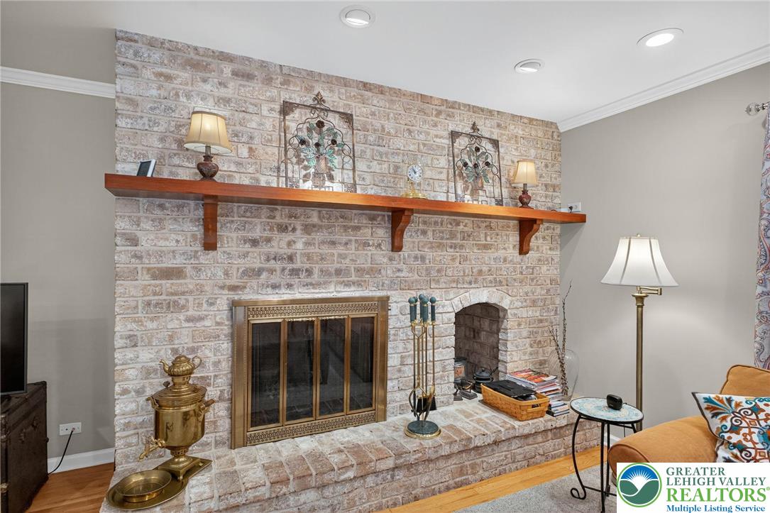 1830 Sherwood Road Allentown, PA 18103 - Photo 20 of 68 a living room with furniture and a fireplace