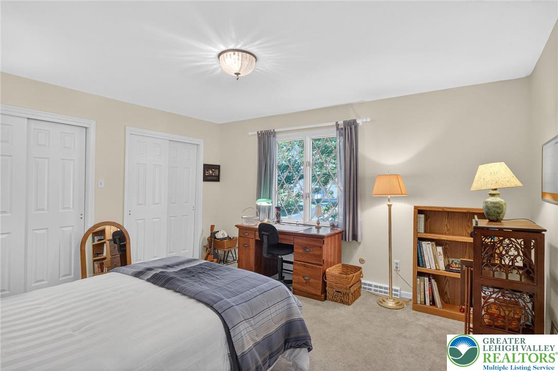 1830 Sherwood Road Allentown, PA 18103 - Photo 25 of 68 a bedroom with a bed and dresser