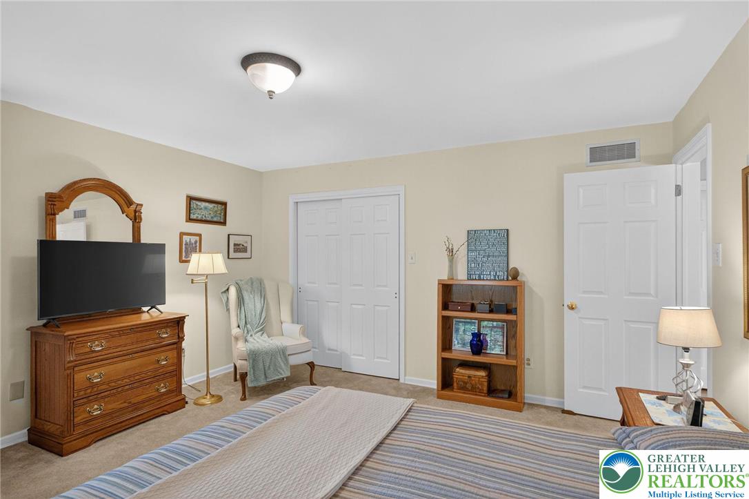 1830 Sherwood Road Allentown, PA 18103 - Photo 31 of 68 a living room with furniture and a flat screen tv