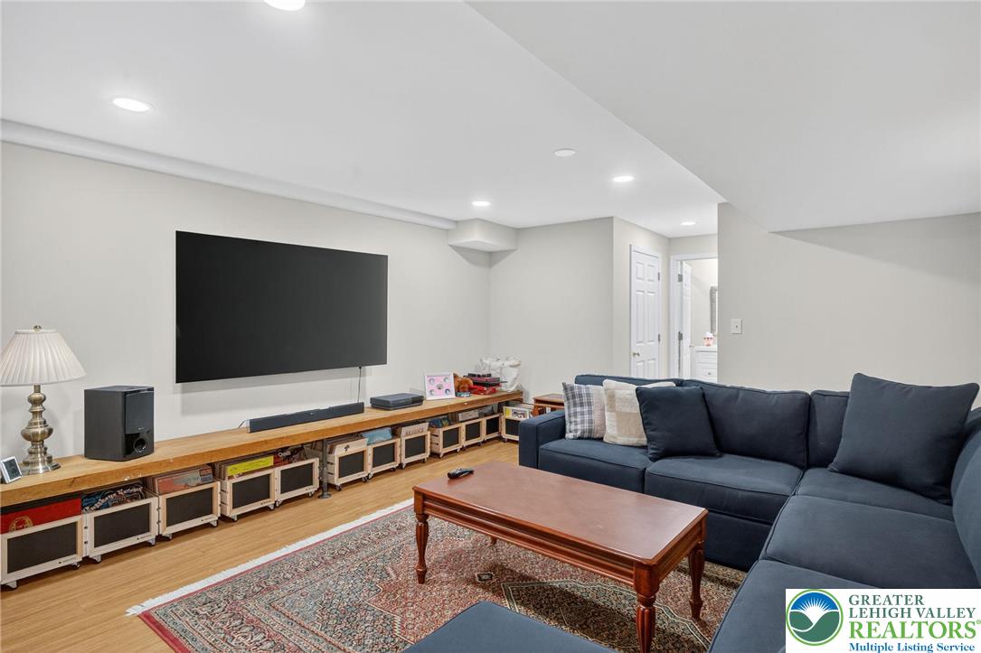 1830 Sherwood Road Allentown, PA 18103 - Photo 42 of 68 a living room with furniture and a flat screen tv